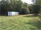 13.87 Acres with Cabin Pole Barn and Much More Photo 10