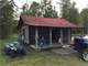 13.87 Acres with Cabin Pole Barn and Much More Photo 1