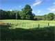 Large Farm with Acres and Pole Barns Photo 11
